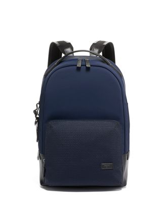 tumi navy blue backpack