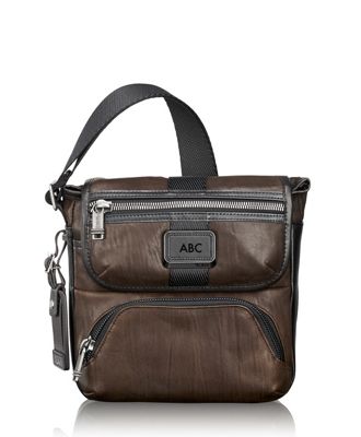 tumi leather travel bag