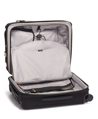 tumi black and gold luggage