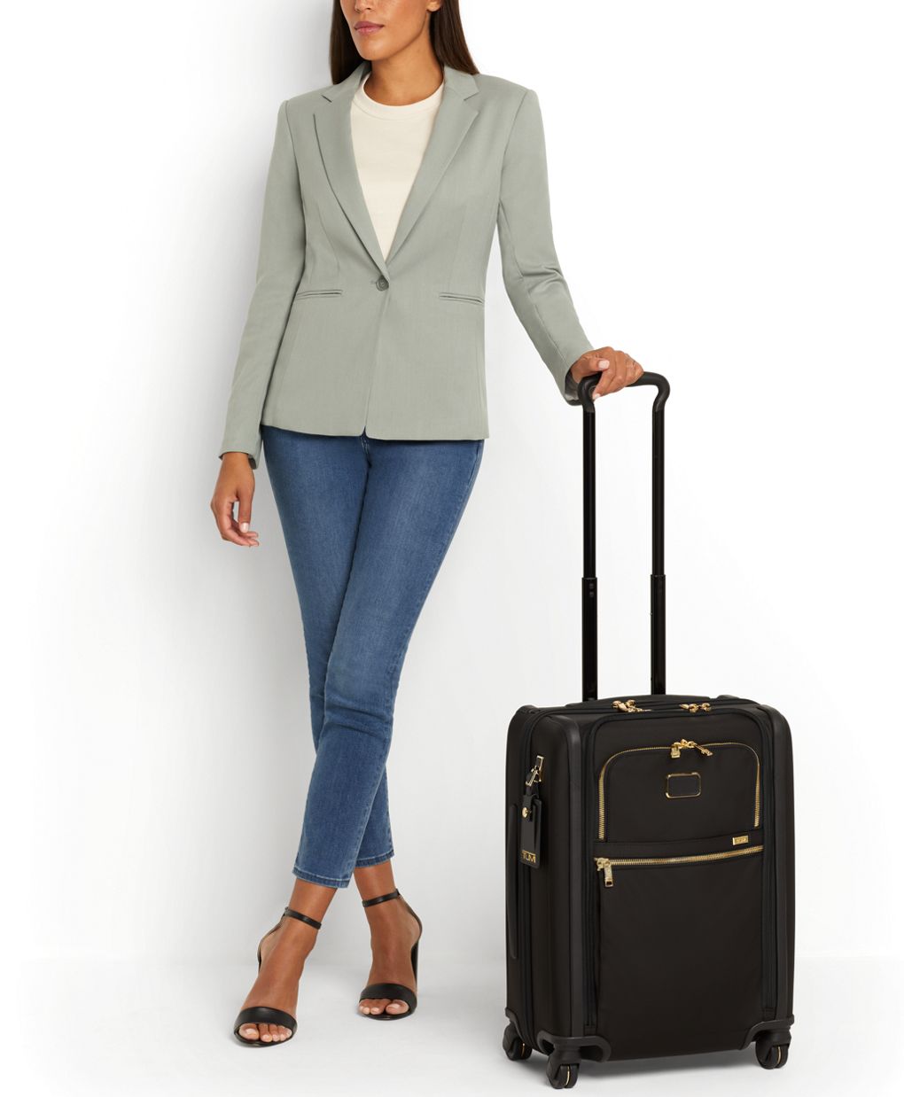 Tumi black and gold luggage sale