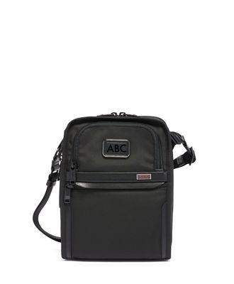 tumi travel handbag