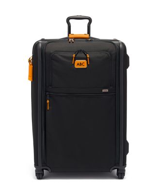 tumi orange carry on