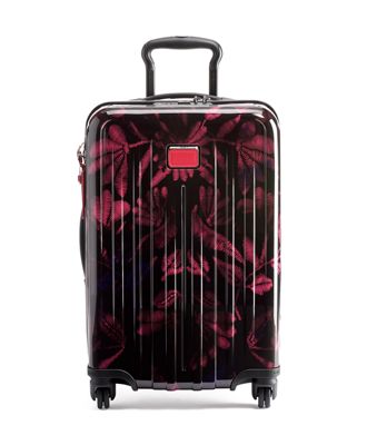 tumi purple luggage