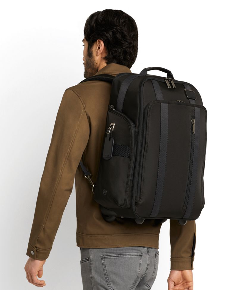 tumi backpack wheels