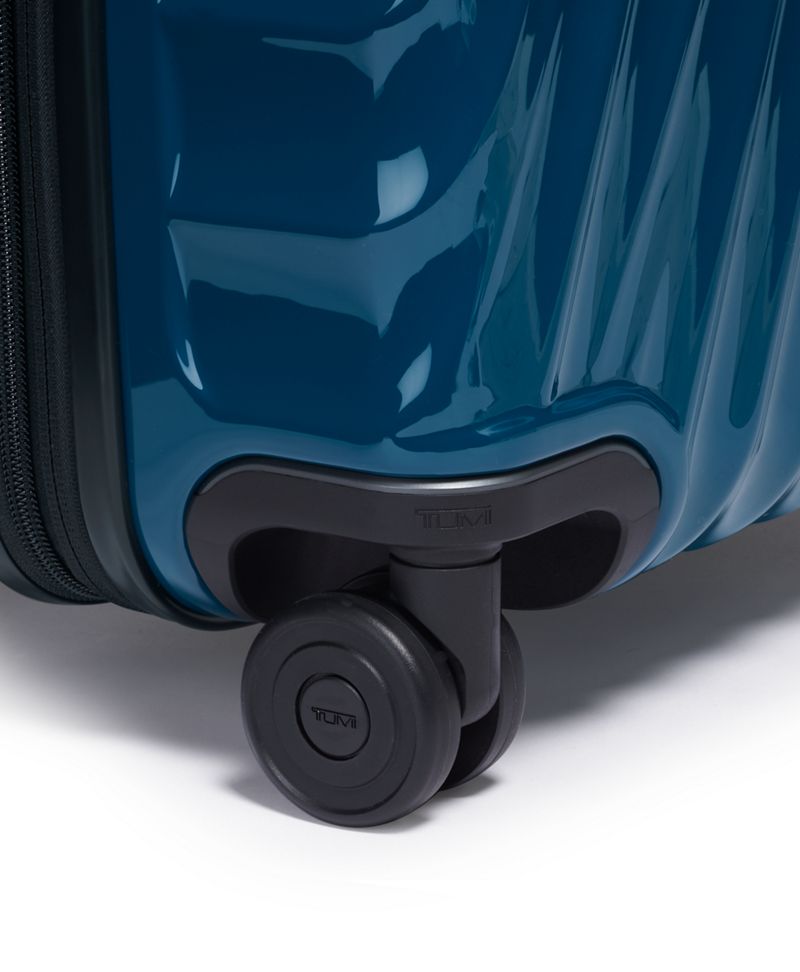 Dark  Turquoise International Expandable 4 Wheeled Carry-On
