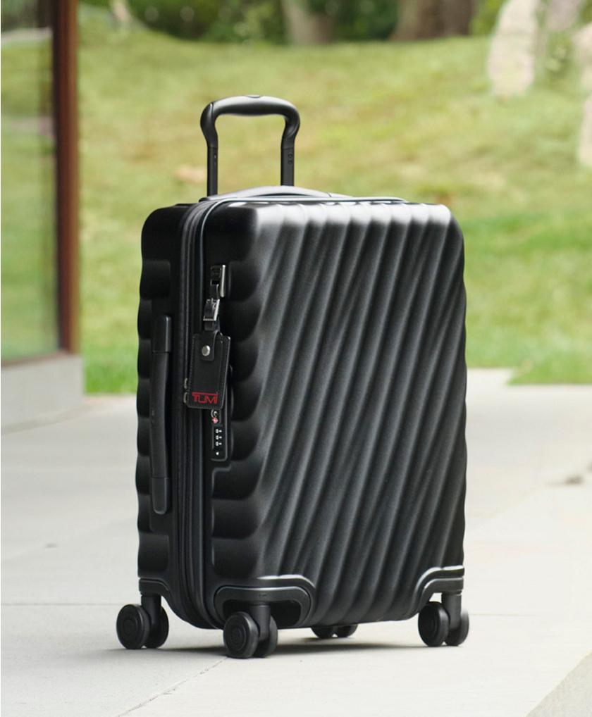 International Expandable 4 Wheeled Carry-On