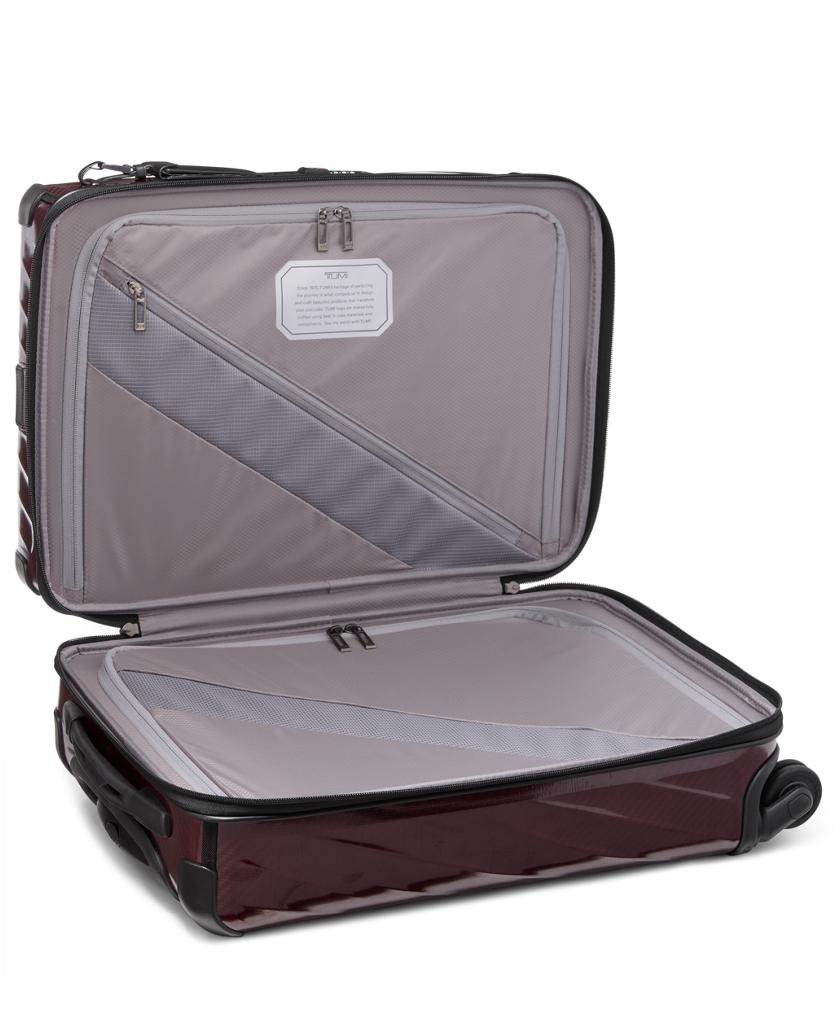 International 4 Wheeled Carry-On