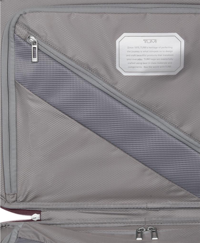 International 4 Wheeled Carry-On