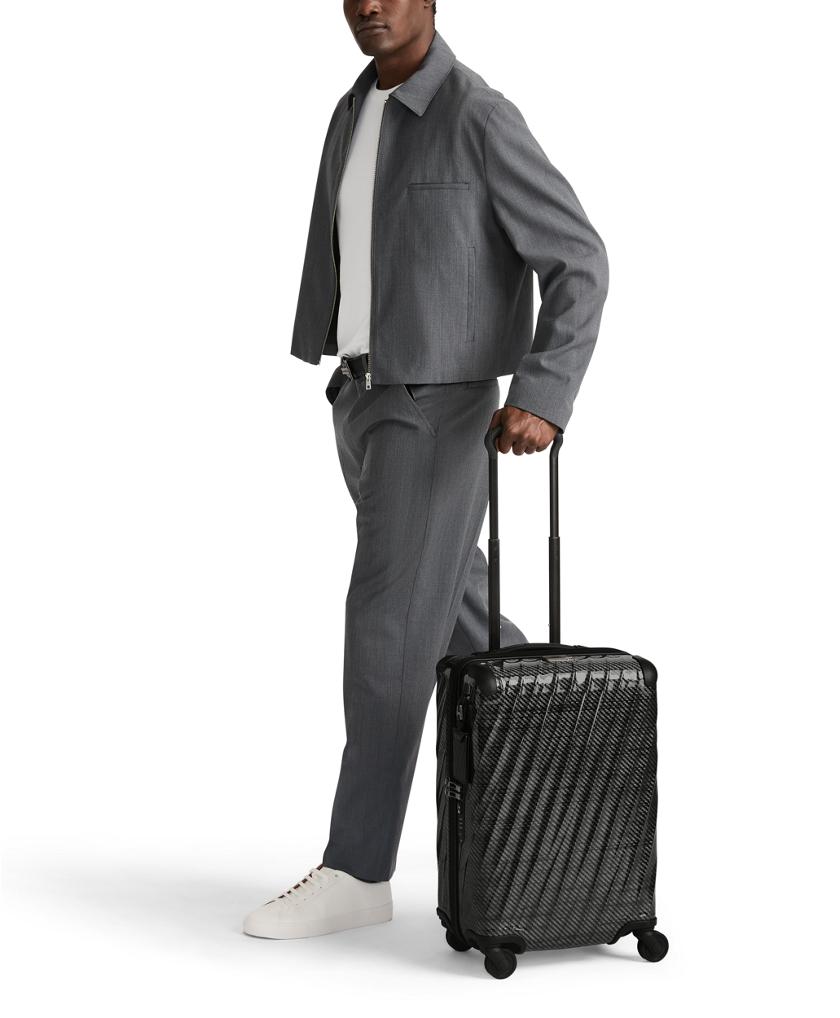 International 4 Wheeled Carry-On